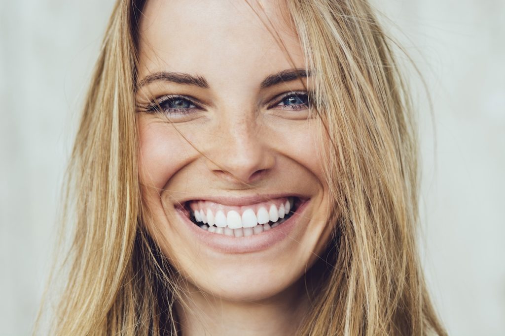 Woman with straight teeth