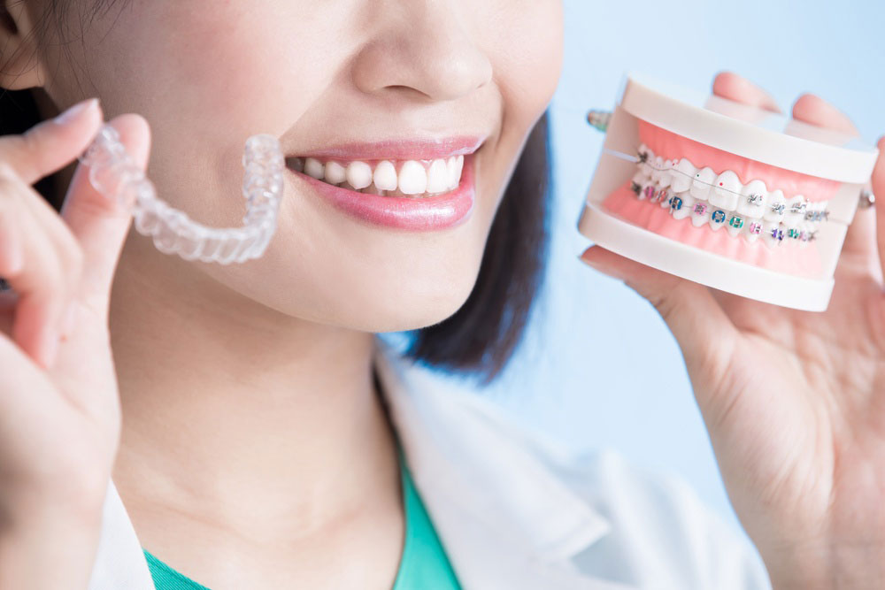 patient deciding between invisalign or braces for orthodontic treatment